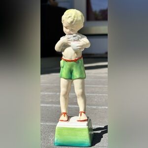 Royal Worcester piece “Friday's Child is Loving and Giving porcelain Figurine